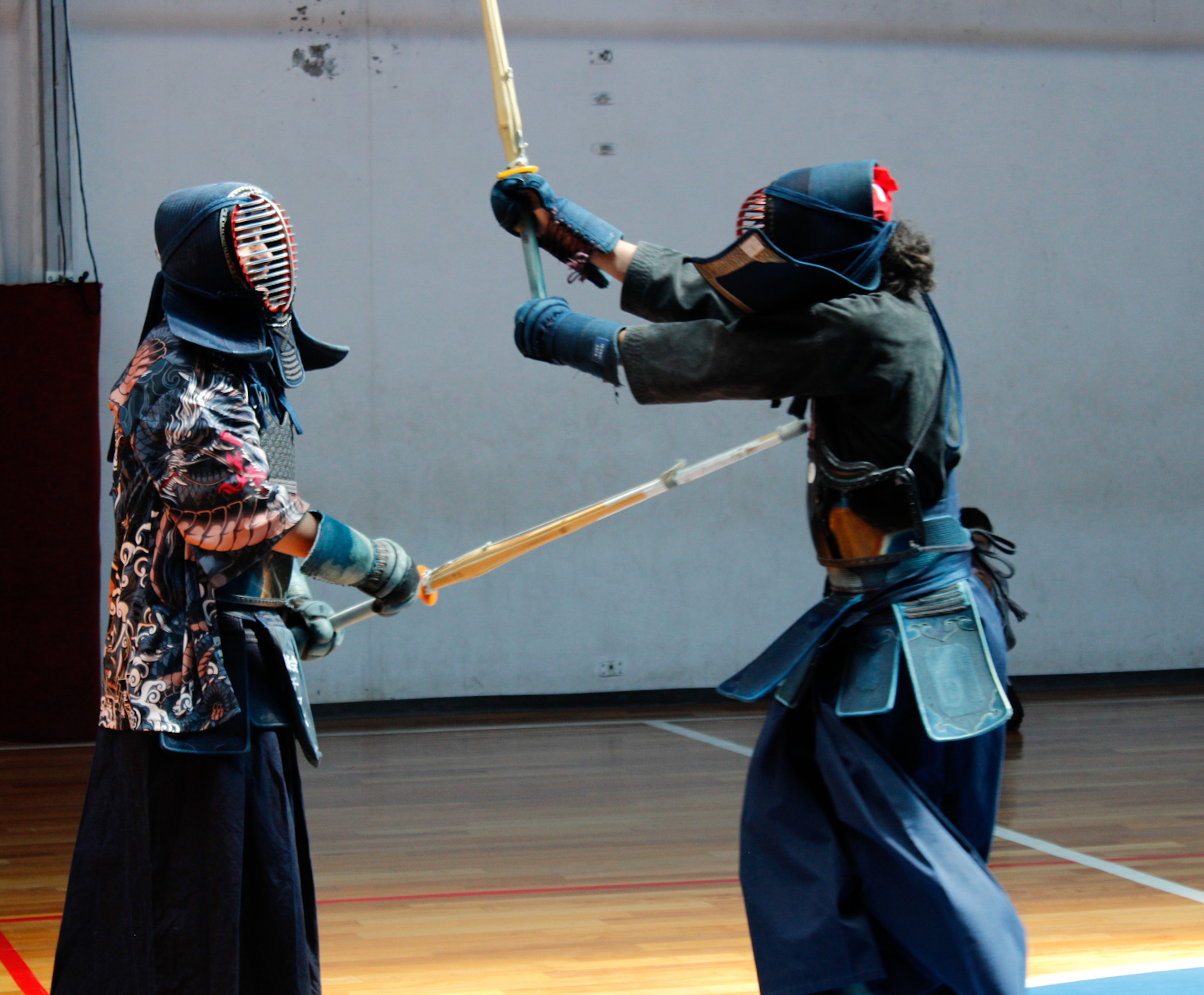 Kendoka in bogu during intense exchange — waza applied in keiko