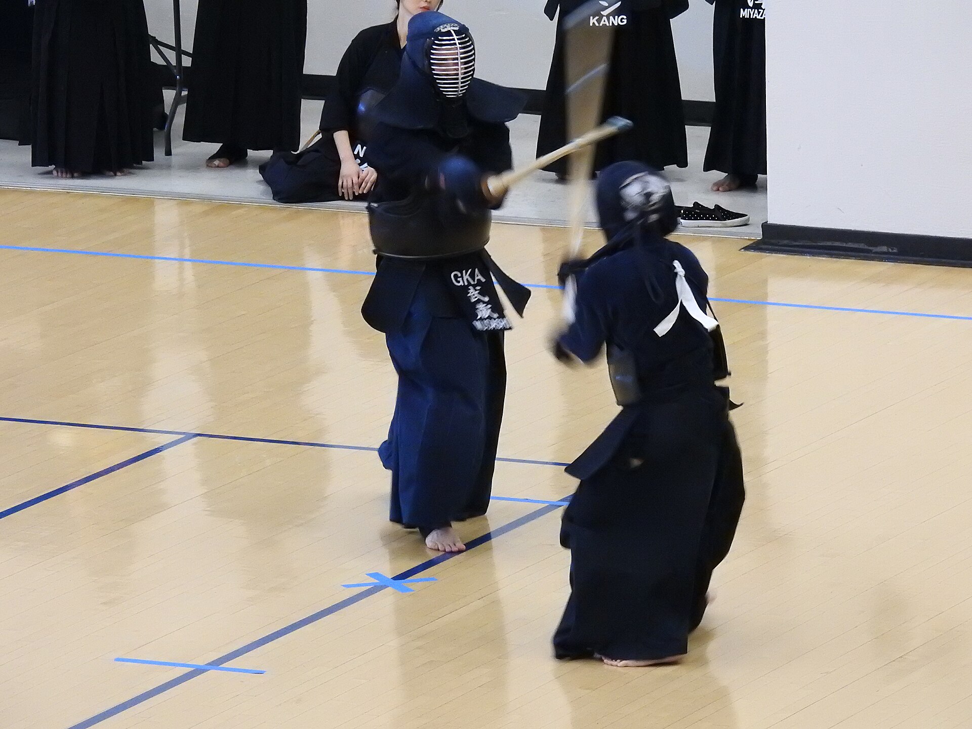 Kendoka executing a men strike, showing full-body kinetic chain