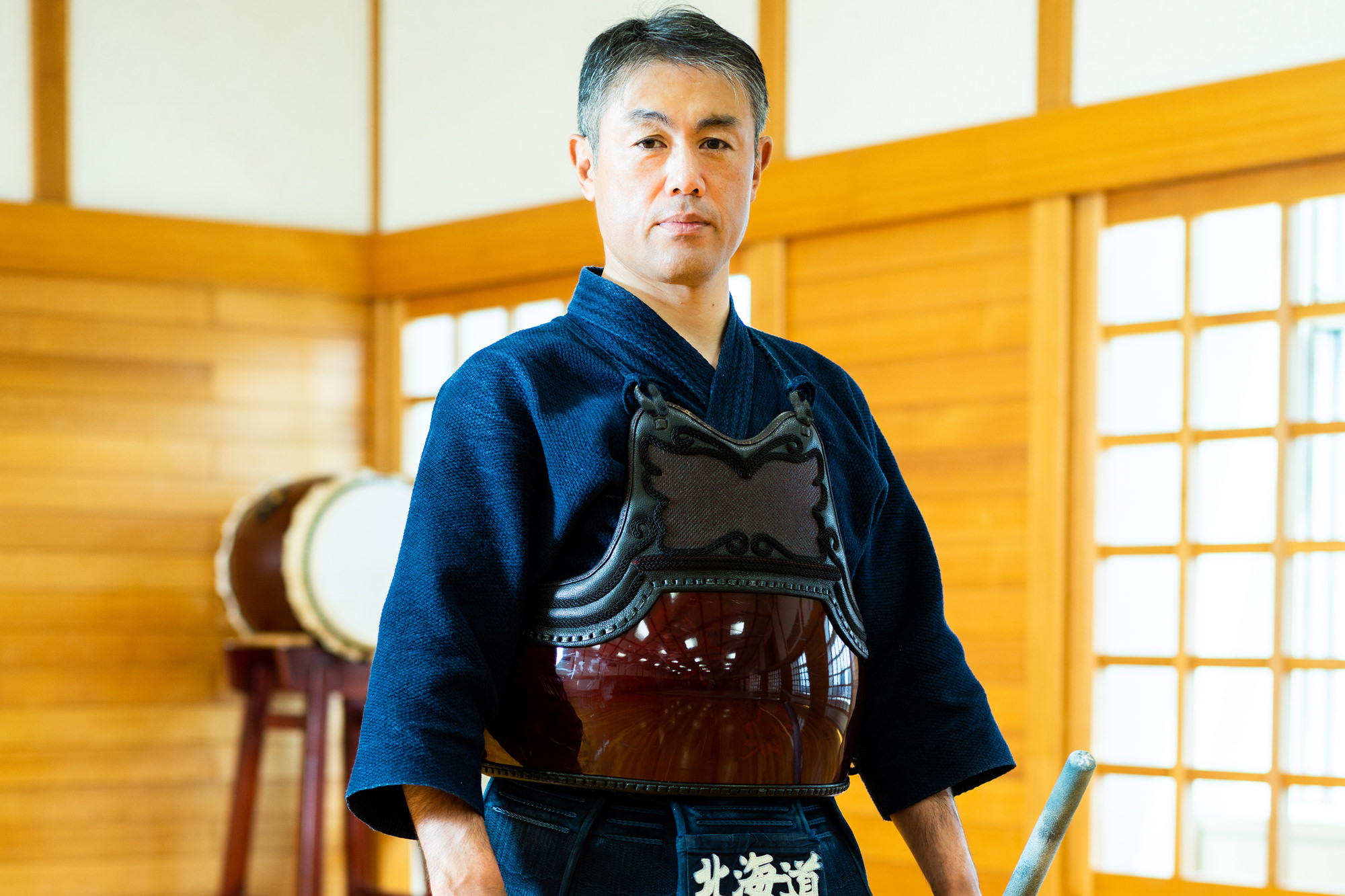 Eiga Naoki (栄花直輝, Hokkaido) focused portrait in bogu without men, holding shinai